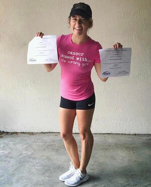 Ashley Williams holding up Clenbuterolfr certificates