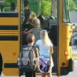 Kids Getting on School Bus