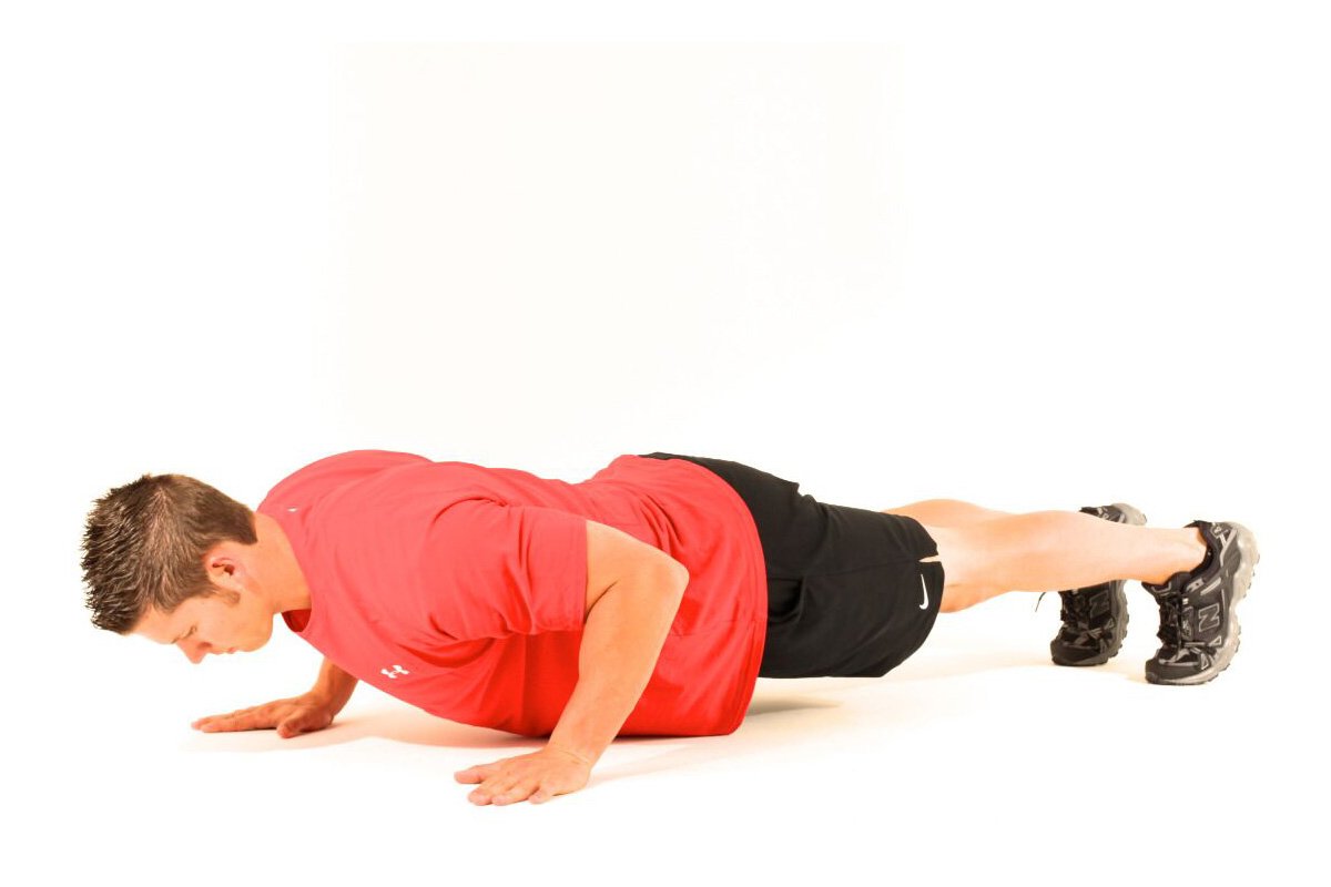trainer doing a pushup
